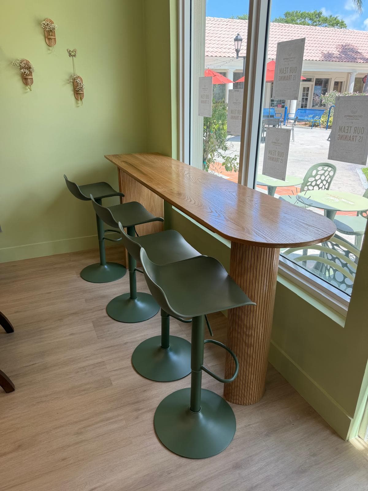Custom wood bar counter with fluted column base — commercial build by Benito Fine Carpentry Wellington FL