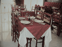 Restaurant dining room with custom wood tables and chairs set for service — hotel-grade by Benito Fine Carpentry
